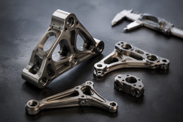 Titanium material for high strength precision components