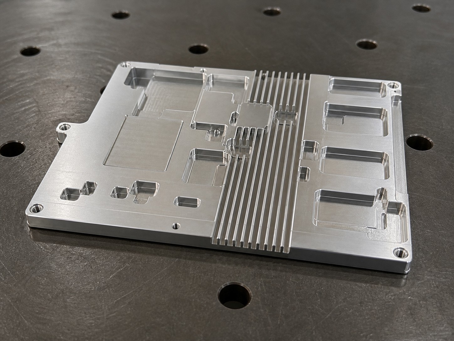 Prototype Machining of a Plate Heat Sink: Hole-Slot Relationships, Datums and Burr Control