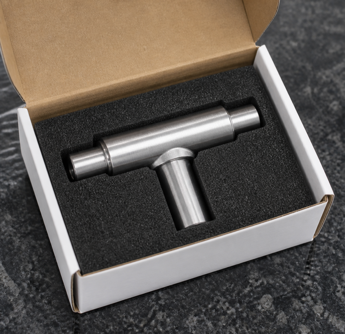 Protected packaging for a precision machined wrist cross shaft