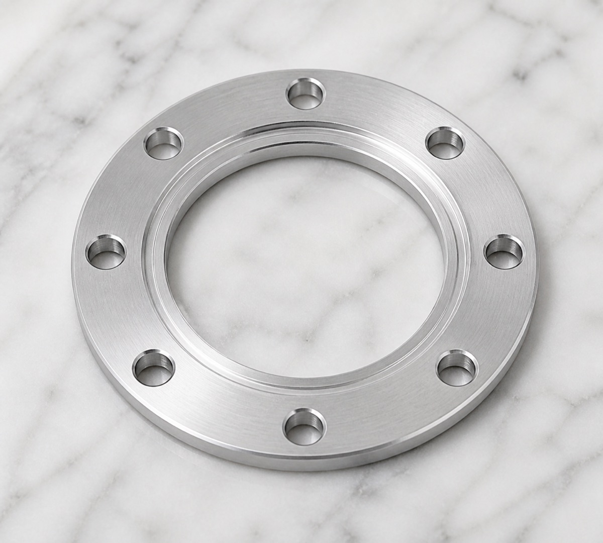 6061-T6 aluminum bearing retaining ring with stepped inner bore and circular hole pattern