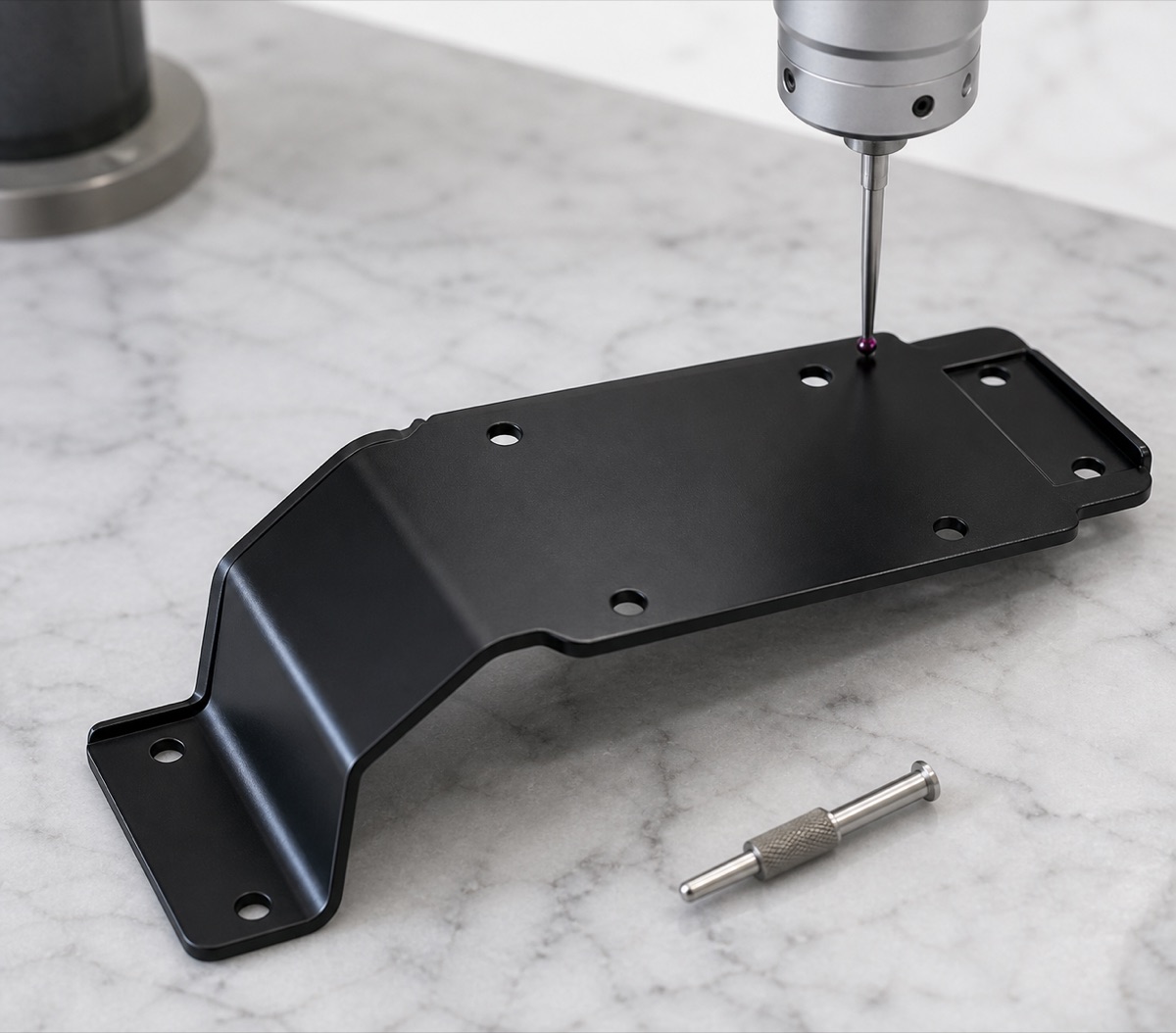 Inspection of bend height and mounting hole position on black anodized PCB bracket