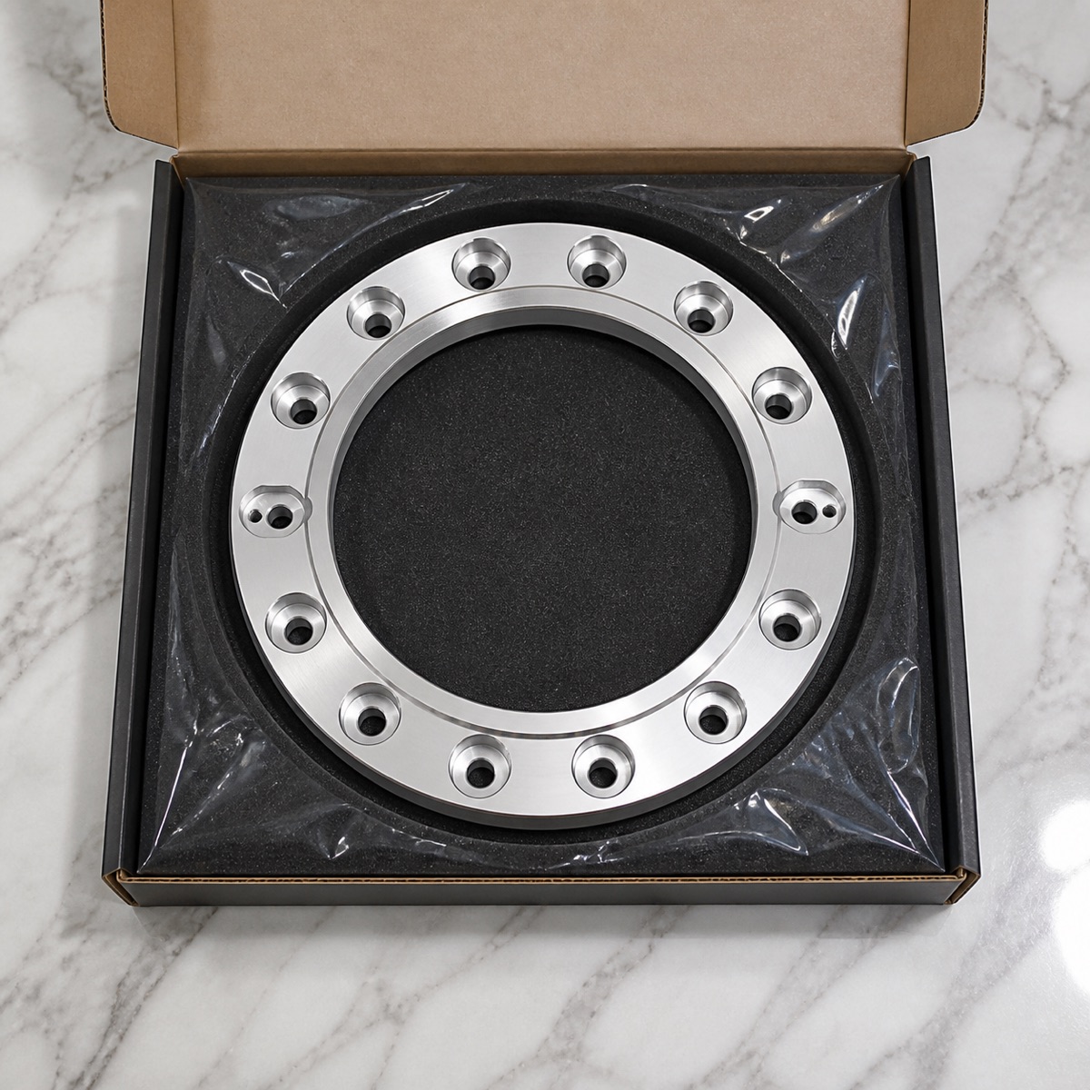 Protected packaging for a 6061-T6 annular robot arm fixed flange