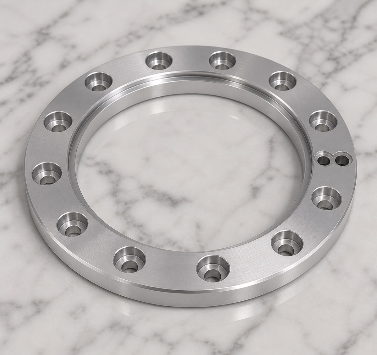 6061-T6 annular fixed flange with center bore concentric steps and counterbore pattern