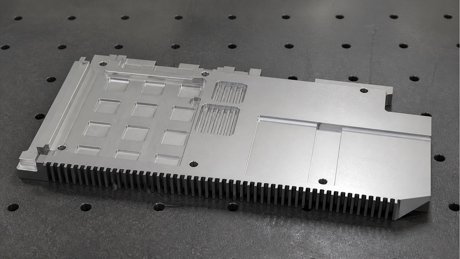 Machining a Finned Plate Guard for an Electronic Cooling Module: Hole-Slot Relationships and Burr Control