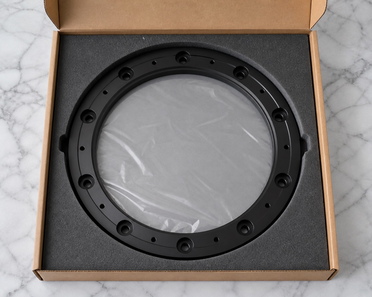 Single-part foam packaging for a thin-wall black anodized robot fixed ring