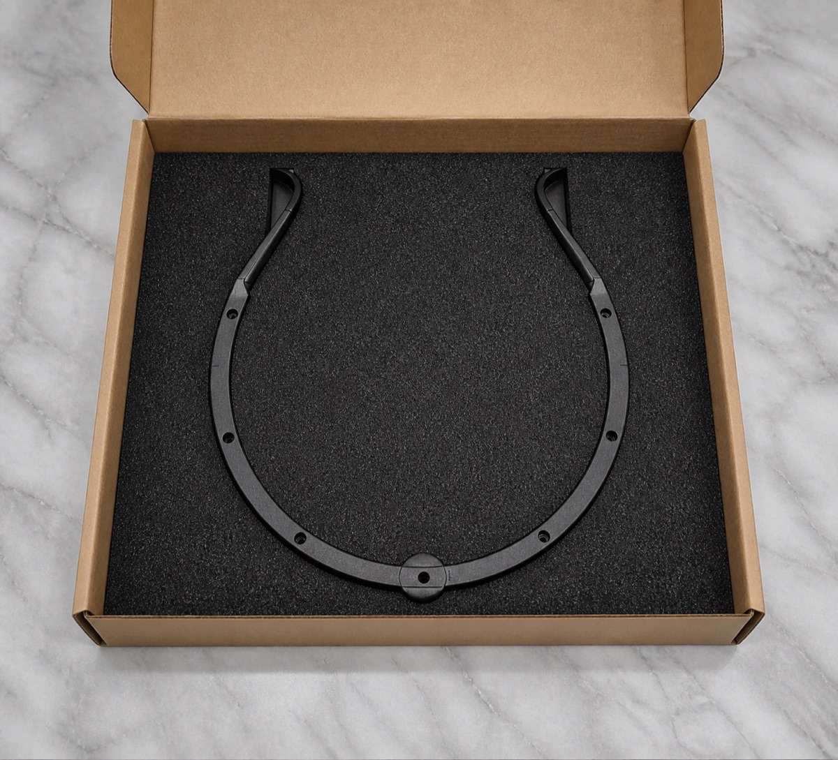 Foam packaging for a black ABS curved decorative cover
